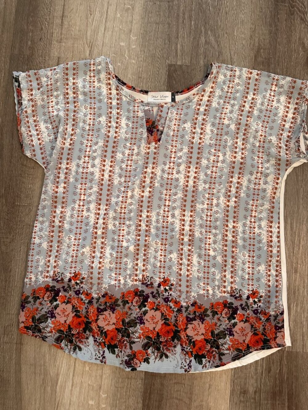 Star Vixen floral top size XL